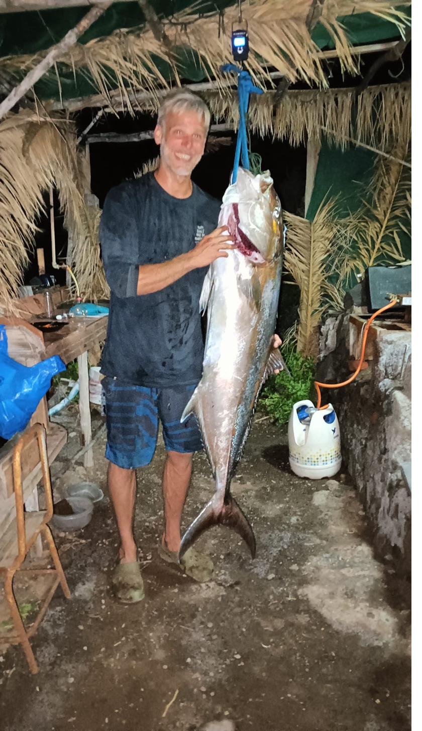 Monster amberjack hanging at camp